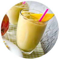 Mango smoothie with straw